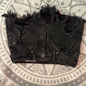 black ripped jean shorts